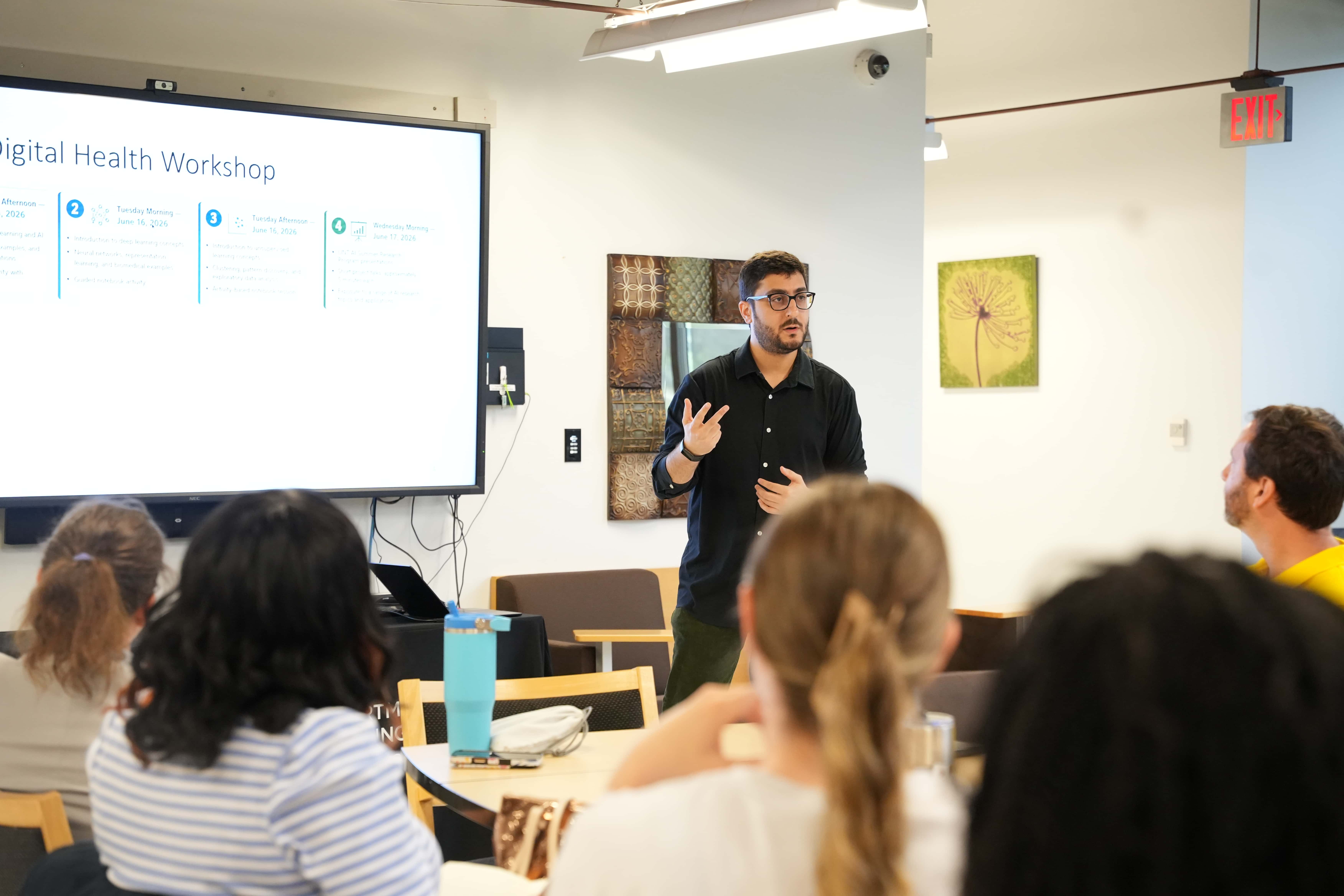 Program director Mahdi Pedram leading a class