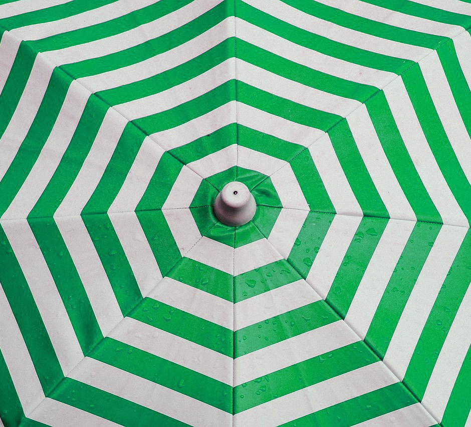 green and white striped umbrella