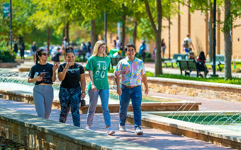 students walking in the Onstead Promenade