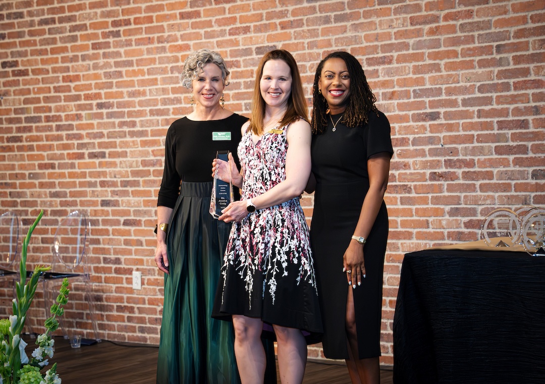 Jessica Craig receiving award on stage