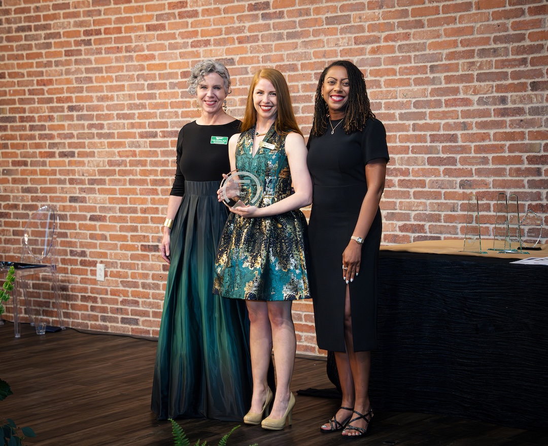 Kerry Goldmann receiving award on stage
