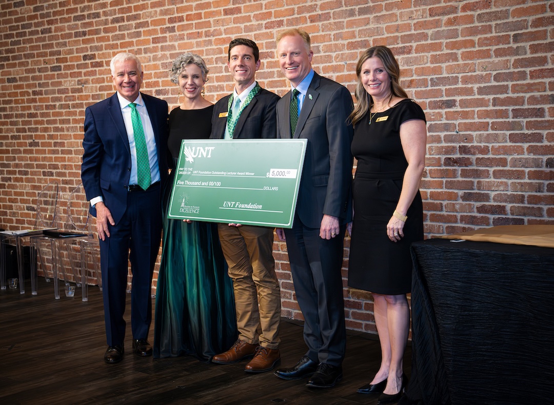 Benjamin Graf receiving award on stage
