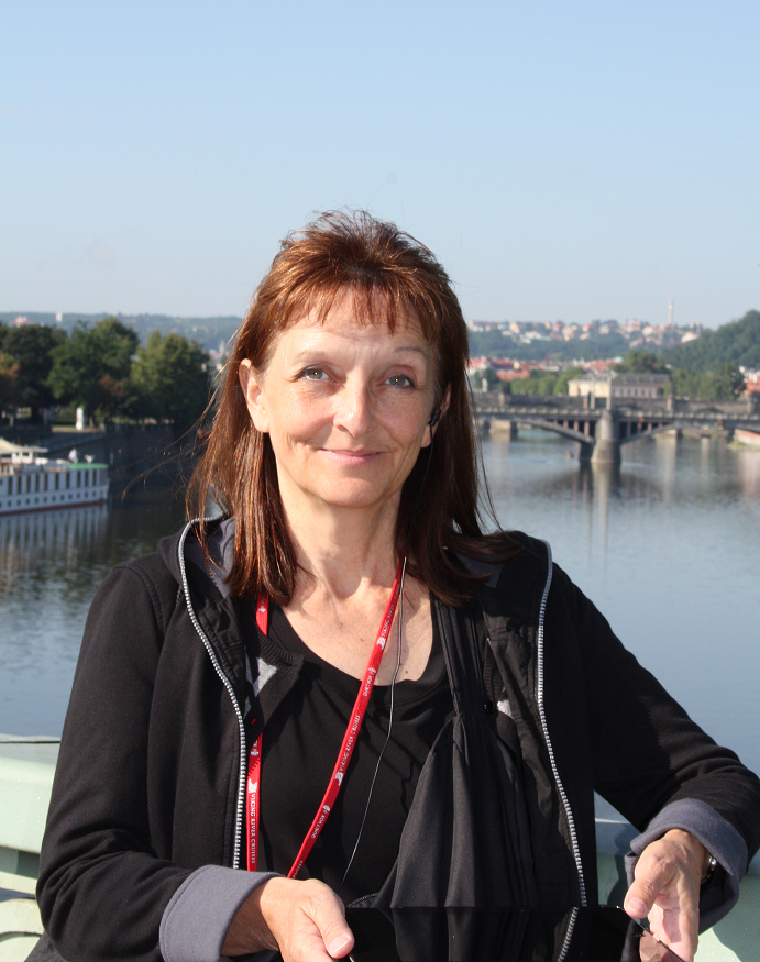 Marjorie Tieslau posing in front of the Seine River