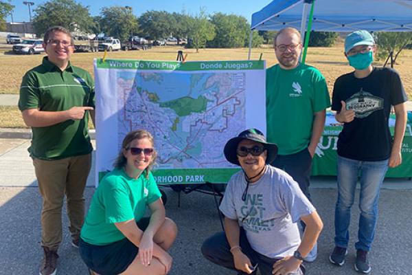 Faculty and students in UNT AERI pose in front of new park