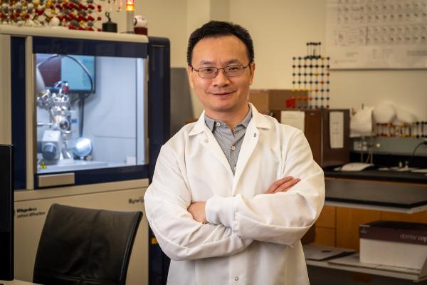 Professor Shengqian Ma posing in his lab