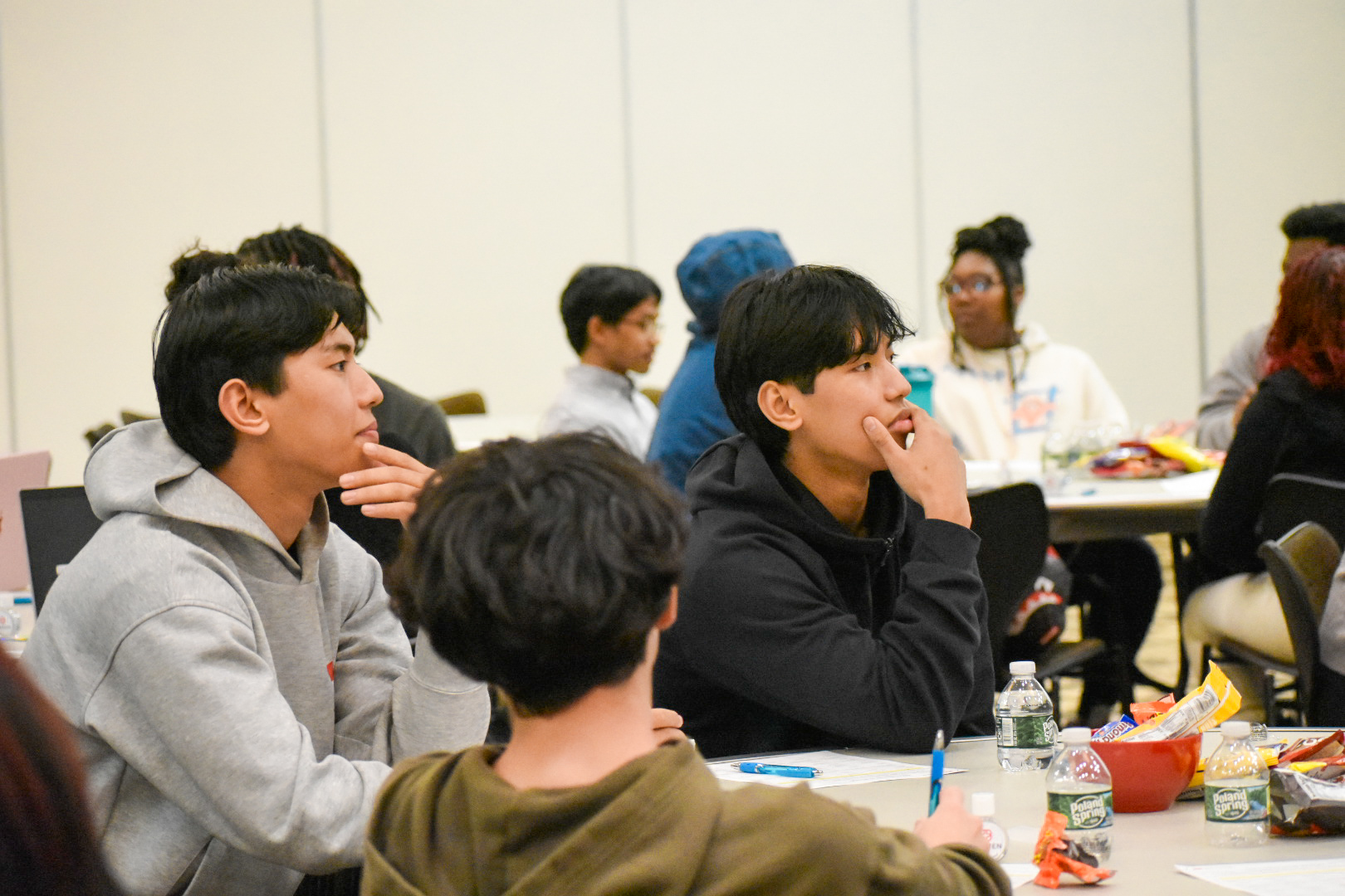 Two male students sitting at a table 